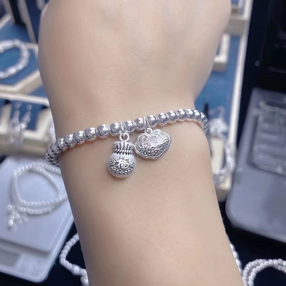 （热卖）手链  SL99-7福锁福袋手链串珠手串手工素款光珠