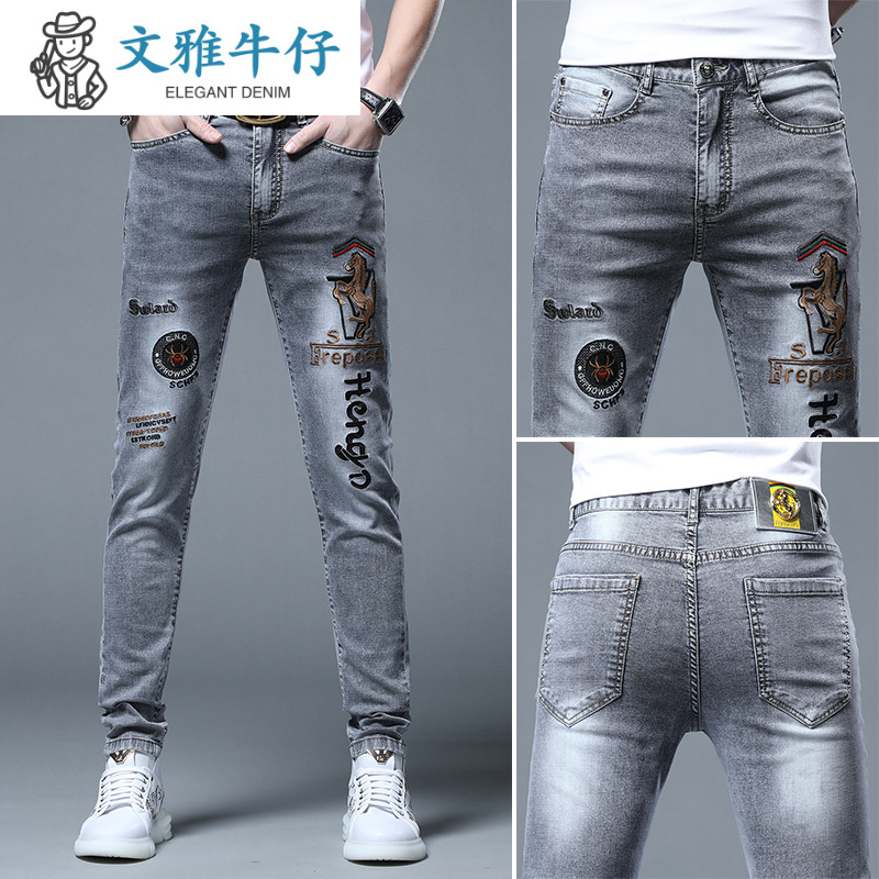 薄款百搭牛仔裤浅色修身小脚刺绣潮牌秋款破洞2023新款长裤子男
