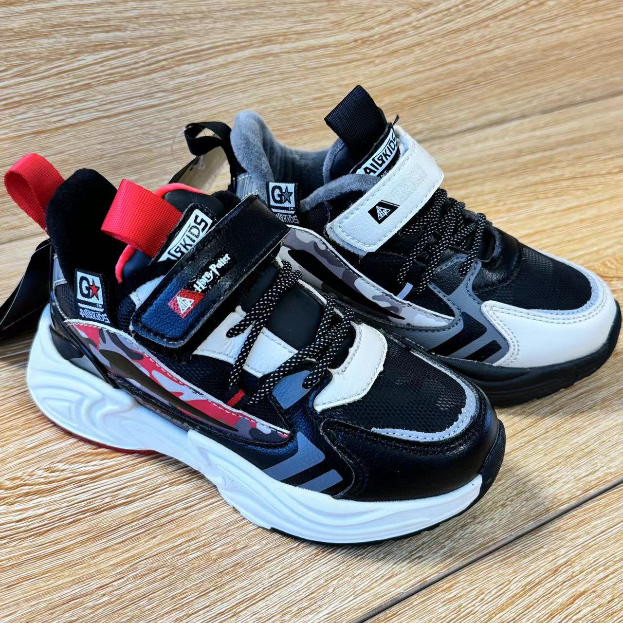 儿童冬季加绒皮面纽扣运动鞋26-37码1067