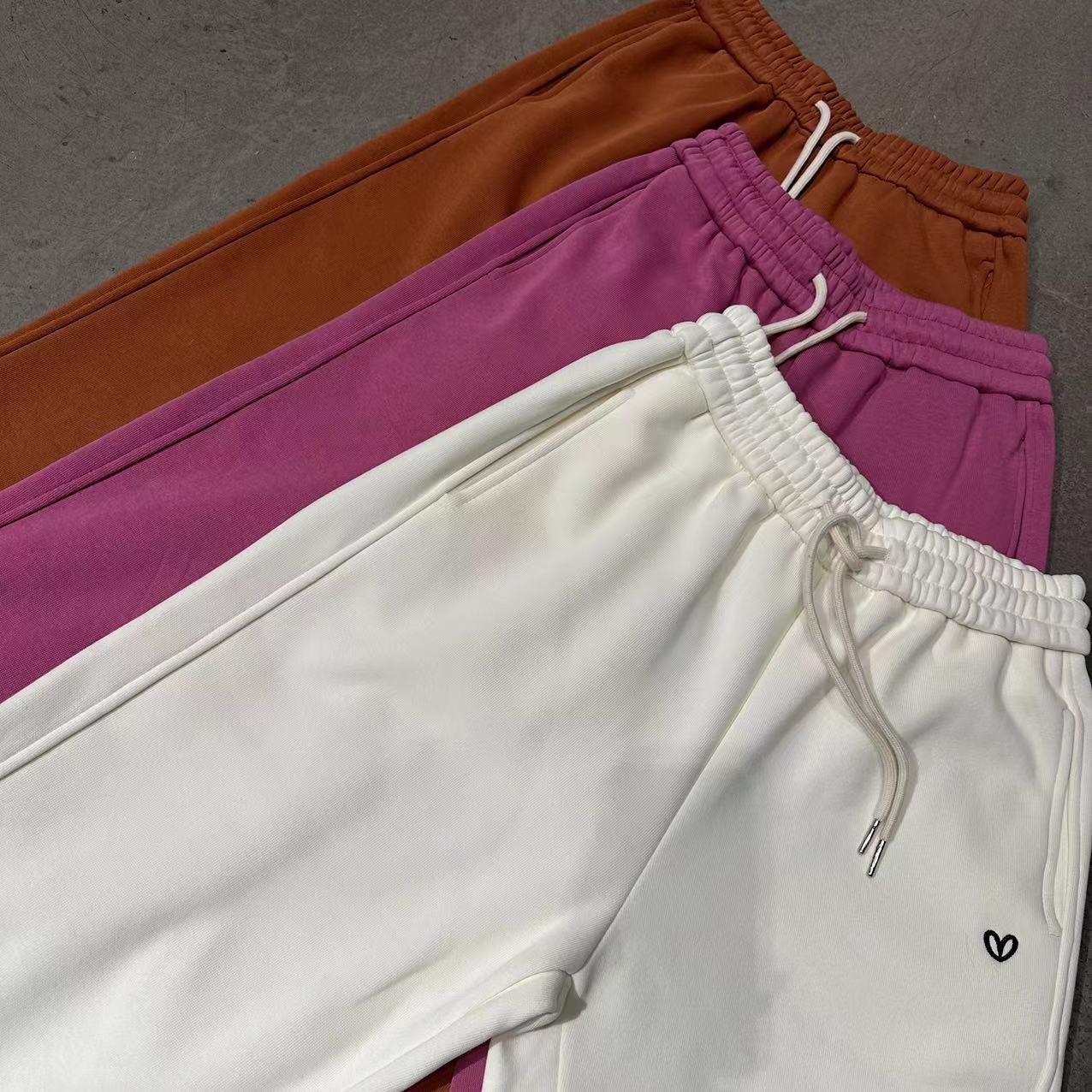 （叶子服饰）爱心加绒时尚百搭秋冬橘色卫裤