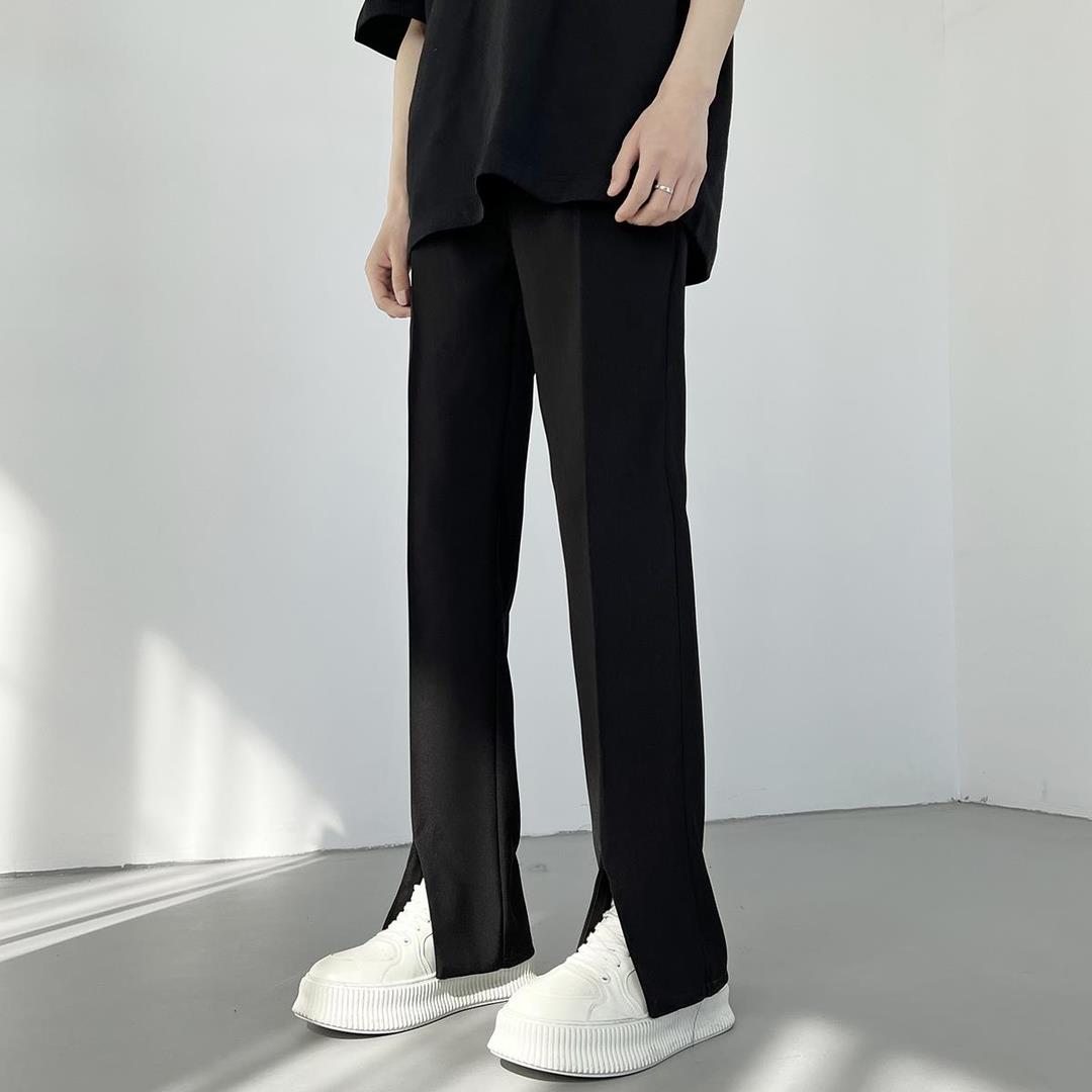裤子男款秋季高级感痞帅垂感裤脚开叉休闲长裤黑色直筒修身微喇裤