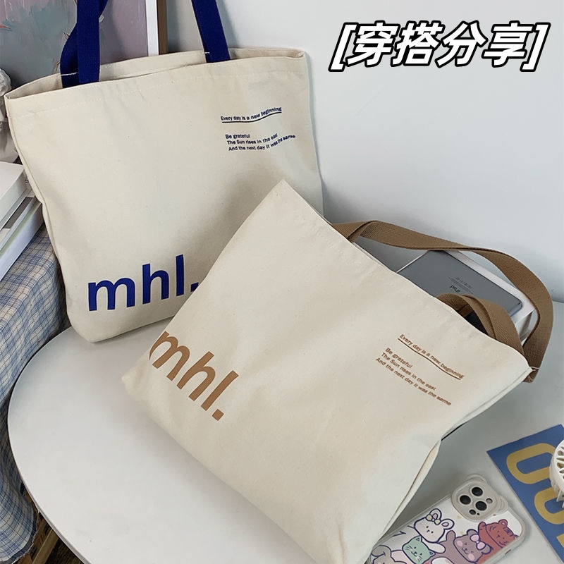 2023年新款托特字母单肩帆布包包男女书上课大学生通勤手提环保袋