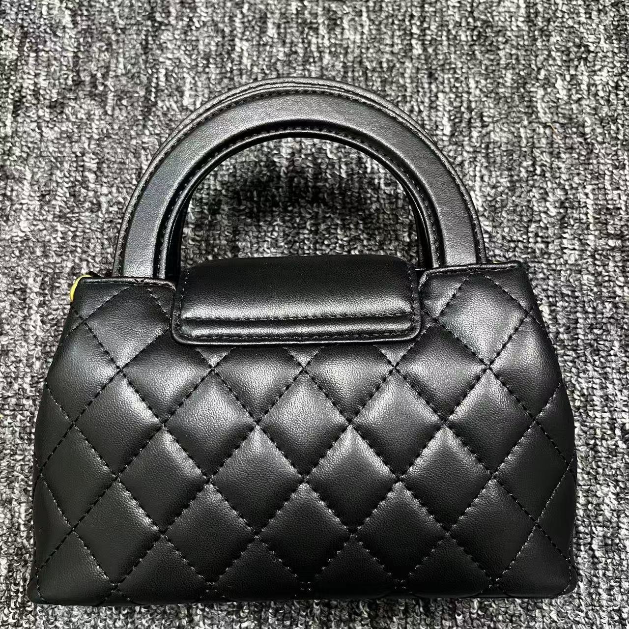 姝宴真皮女包小手提10429黑色