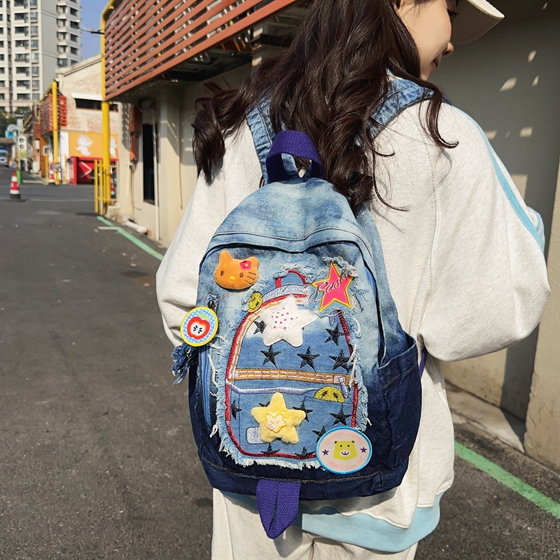 少女书包韩版日系小众可爱星星双肩包女卡通时尚休闲百搭牛仔背包