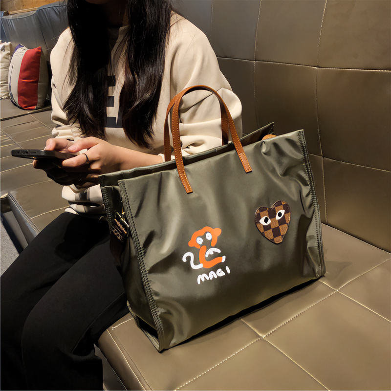 2024新款手提便携旅行包时尚简约学生旅行收纳包女包大容量托特包